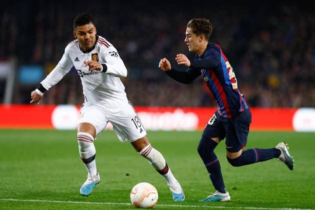 February 16, 2023, BARCELONA, BARCELONA, SPAIN: Pablo Martin Gavi of FC Barcelona, Barca and Carlos Henrique Casemiro of Manchester United, ManU in action during the UEFA Europa League, knockout round play-off, football match played between FC Barcelona and Manchester United at Spotify Camp Nou stadium on February 16, 2023, in Barcelona, Spain. BARCELONA SPAIN - ZUMAa181 20230216_zaa_a181_168 Copyright: xOscarxJ.xBarrosox