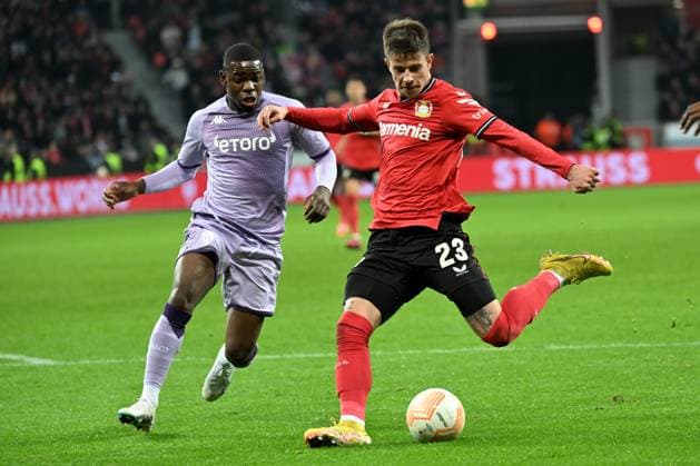 Leverkusen, Bayarena, 16 02 23, GER, Men, UEFA Europa League, Bayer 04 Leverkusen AS Monaco Picture from left in duel Eliot Matazo AS Monaco and Adam Hlozek Leverkusen Only for journalistic use Only for editorial use According to the regulations of the DFL Deutsche Fußball Liga it is prohibited, DFL regulations prohibit any use of photographs as image sequences and or quasi video North Rhine Westphalia Germany