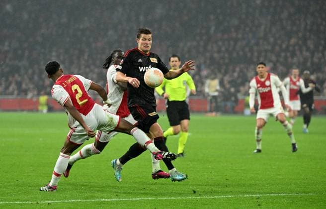 Football, Men, 2022 2023 season, Europa League Play Offs to the round of 16, first leg , Ajax Amsterdam 1 FC Union Berlin 0 0 , v l Jurrien Timber Ajax Amsterdam , Calvin Bassey Ajax Amsterdam , Kevin Behrens 1 FC Union Berlin , 16 02 2023, Copyright: xMatthiasxKochx