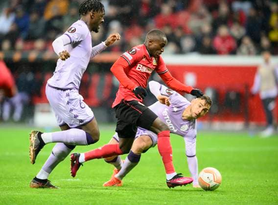 Moussa DIABY LEV on the way to the goal to 1 1, f l Axel DISASI Monaco , Moussa DIABY LEV , Ruben AGUILAR Monaco , action, duel, Football Europa League, K o round Play off first leg, Bayer 04 Leverkusen LEV AS Monaco, on 16 02 2023 in Leverkusen Germany UEFA regulations prohibit any use of photographs as image sequences and or quasi video Â