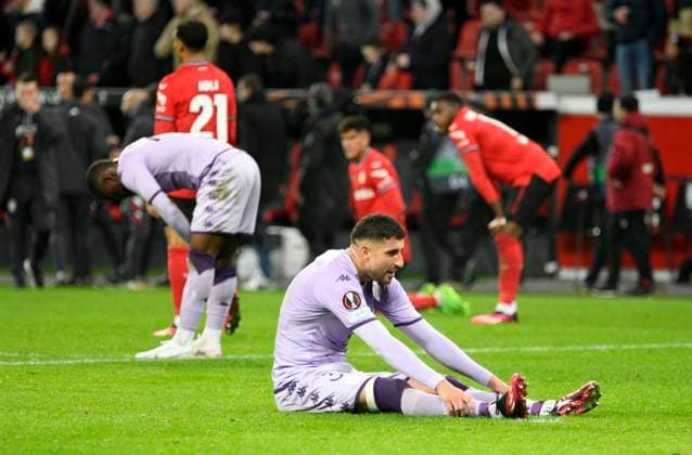 BayArena Leverkusen, 16 2 2023, Football UEFA Europa League Season 2022 23, Play off round, Bayer 04 Leverkusen B04 vs AS Monaco ASM Players exhausted after exhausting game, front Guillermo Maripan ASM UEFA REGULATIONS PROHIBIT ANY USE OF PHOTOGRAPHS AS IMAGE SEQUENCES AND OR QUASI VIDEO