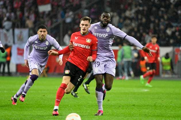 BayArena Leverkusen, 16 2 2023, Football UEFA Europa League Season 2022 23, Play off round, Bayer 04 Leverkusen B04 vs AS Monaco ASM Florian Wirtz B04 , Youssouf Fofana ASM UEFA REGULATES PROHIBIT ANY USE OF PHOTOGRAPHS AS IMAGE SEQUENCES AND OR QUASI VIDEO