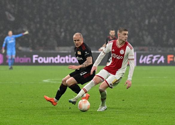 Football, men, season 2022 2023, Europa League Play Offs to the round of 16, first leg , Ajax Amsterdam 1 FC Union Berlin 0 0 , v l Sven Michel 1 FC Union , Kenneth Taylor Ajax Amsterdam , 16 02 2023, Copyright: xMatthiasxKochx