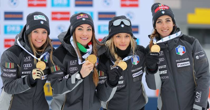 BIATHLON - IBU WC Oberhof OBERHOF,GERMANY,19.FEB.23 - BIATHLON - IBU World Championships 2023, 4x6 km relay, ladies, award ceremony. Image shows the rejoicing of Samuela Comola, Dorothea Wierer, Hannah Auchentaller and Lisa Vittozzi (ITA). Keywords: medal.  GEPAxpictures xThomasxBachun
