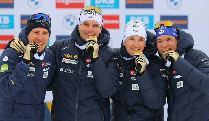 BIATHLON - IBU WC Oberhof OBERHOF,GERMANY,19.FEB.23 - BIATHLON - IBU World Championships 2023, 4x7.5 km relay, men, award ceremony. Image shows the rejoicing of Quentin Fillon Maillet, Emilien Jacquelin, Fabien Claude and Antonin Guigonnat (FRA). Keywords: medal.  GEPAxpictures xThomasxBachun