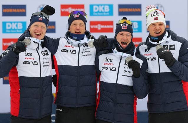 BIATHLON - IBU WC Oberhof OBERHOF,GERMANY,19.FEB.23 - BIATHLON - IBU World Championships 2023, 4x7.5 km relay, men, award ceremony. Image shows the rejoicing of Johannes Thingnes Boe, Tarjei Boe, Sturla Holm Laegreid and Vetle Sjaastad Christiansen (NOR). Keywords: medal.  GEPAxpictures xThomasxBachun