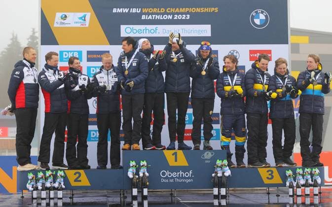 BIATHLON - IBU WC Oberhof OBERHOF,GERMANY,19.FEB.23 - BIATHLON - IBU World Championships 2023, 4x7.5 km relay, men, award ceremony. Image shows the rejoicing of team Norway, team France and team Sweden. Keywords: medal.  GEPAxpictures xThomasxBachun
