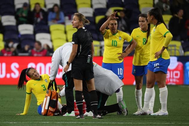 NASHVILLE, TN - FEBRUARY 19: Brazil defender Kathennen (3) is attended to by athletic training staff during the SheBelieves Cup match between Canada and Brazil, February 19, 2023 at GEODIS Park in Nashville, Tennessee. (Photo by Matthew Maxey Icon Sportswire) SOCCER: FEB 19 Women™s SheBelieves Cup - Brazil vs Canada Icon23021931