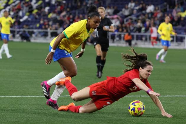 NASHVILLE, TN - FEBRUARY 19: Brazil forward Geyse (18) pulls down Canada defender Allysha Chapman (2) during the SheBelieves Cup match between Canada and Brazil, February 19, 2023 at GEODIS Park in Nashville, Tennessee. (Photo by Matthew Maxey Icon Sportswire) SOCCER: FEB 19 Women™s SheBelieves Cup - Brazil vs Canada Icon23021937