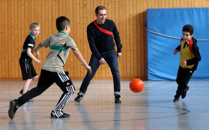 BAU 21 02 2023 Stuttgart Untertürkheim soccer media appointment UEFO Euro 2024 with tournament director Philipp Lahm and ambassador Celia Sasic, Philipp Lahm plays soccer with children