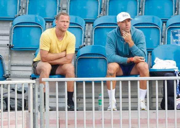 L R Belinda Bencic coach, coach Dmitry Tursunov and Martin Hromkovic sitting on the spectator tribune Tennis Dubai Tennis Championships 2023 WTA Dubai Duty Free Tennis Stadium Dubai United Arab Emirates 21 February 2023 Copyright: xJuergenxHasenkopfx
