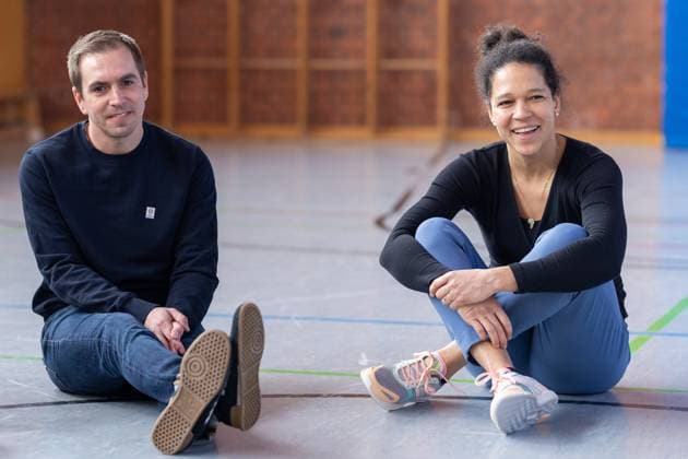 Celia Sasic former national player, ambassador EURO 2024 and Philipp Lahm former national player, EURO 2024 tournament director sit in a circle with the children of the project As part of a working visit in the run-up to UEFA EURO 2024, the tournament director Philipp Lahm former German national player and ambassador Celia Sasic former footballer visit the Luginsland School in Stuttgart The focus is the project Social competence with and through football Project manager Thomas Krombacher presents the project Then take part in it yourself Stuttgart, media appointment with Philipp Lahm and Celia Sasic, 21 02 2023 Copyright: xDennisxDuddek xEibnerxPressefotox EP_DDK