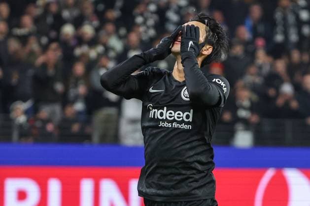 UEFA Champions League Eintracht Frankfurt SSC Napoli on 21 02 2023 at Deutsche Bank Park in Frankfurt Daichi Kamada Frankfurt 15 dissatisfied, disappointed, disappointed, depressed MH