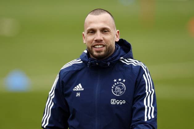 AMSTERDAM - Ajax coach John Heitinga during a training session prior to the UEFA Europa League play-off match between FC Union Berlin and Ajax Amsterdam at sportpark de Toekomst on February 22, 2023 in Amsterdam, Netherlands. ANP KOEN VAN WEEL UEFA Europa League Play-off MD-1 2022 2023 xVIxANPxSportx xxANPxIVx 463316443 originalFilename: 463316443.jpg