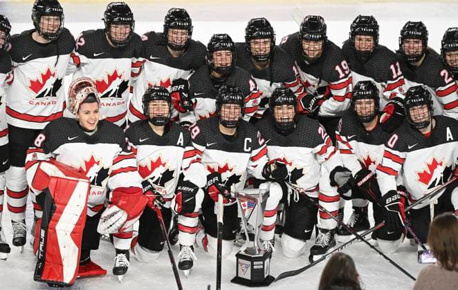 Sport Bilder des Tages February 22, 2023, Laval, PQ, Canada: Players from Canada celebrate with the trophy after defeating the USA in Rivalry Series hockey in Laval, Que., Wednesday, February 22, 2023. Rivalry Series Hockey,  - ZUMAc35_ 20230222_zaf_c35_213 Copyright: xGrahamxHughesx