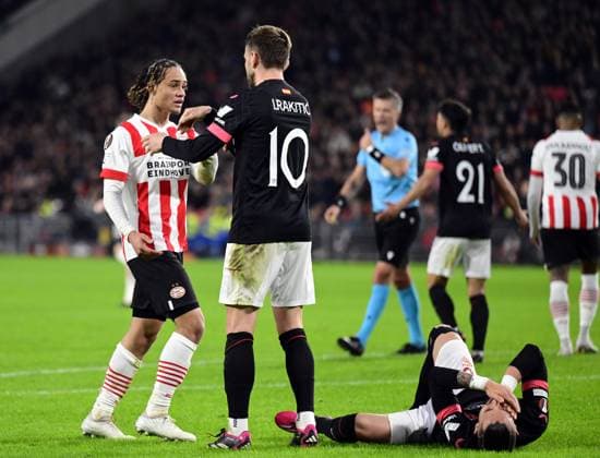 EINDHOVEN - (lr) Xavi Simons of PSV Eindhoven, Ivan Rakitic of Sevilla FC react during the UEFA Europa league play-off match between PSV Eindhoven and Sevilla FC at Phillips stadium on February 23, 2023 in Eindhoven, Netherlands. ANP OLAF KRAAK PSV Eindhoven v Sevilla FC: Knockout Round Play-Off Leg Two - UEFA Europa League 2022 2023 xVIxANPxSportx xxANPxIVx 463447097 originalFilename: 463447097.jpg