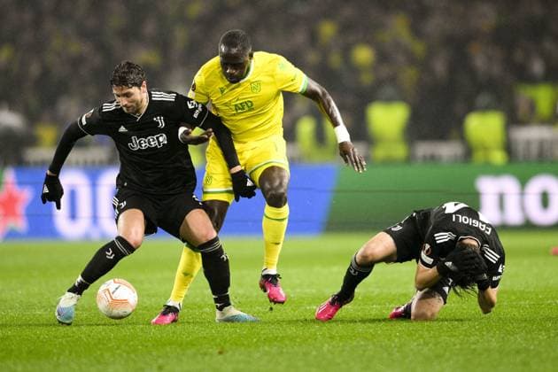 Sport Bilder des Tages Moussa Sissoko (Nantes) vs Manuel Locatelli (Juventus) FOOTBALL : Nantes vs Juventus de Turin - Barrage retour Ligue Europa - 23 02 2023 JBAutissier Panoramic 
