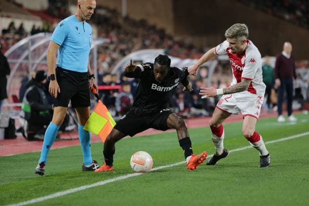 Jeremie Frimpong of Bayer 04 Leverkusen and Caio Henrique of As Monaco during the Uefa Europa League, football match between As Monaco and Bayer 04 Leverkusen,on 23 February 2023 at State Luis II in Monaco, Photo Ndrerim Kaceli  Copyright: xNderimxKaceli LiveMediax xipa-agx xLivexMediax 0 IPA_IPA36301755