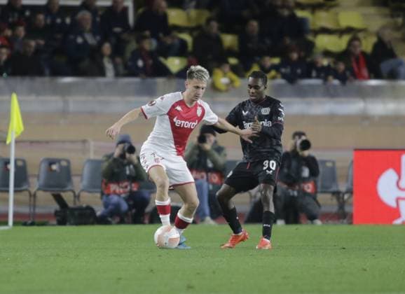February 23, 2023, Monaco, Principality of Monaco: Aleksandr Golovin of As Monaco and Jeremie Frimpong of Bayer 04 Leverkusen during the Uefa Europa League, football match between As Monaco and Bayer 04 Leverkusen,on 23 February 2023 at State Luis II in Monaco, Photo Ndrerim Kaceli. football Europa League match - AS Monaco vs Bayer Leverkusen, Monaco, Principality of Monaco  - ZUMAl164 20230223_zsa_l164_010 Copyright: xNderimxKacelix