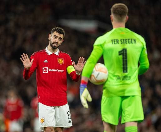 Football - UEFA Europa League - Play-Off 2nd Leg - Manchester United, ManU FC v FC Barcelona, Barca MANCHESTER, ENGLAND - Thursday, February 23, 2023: Manchester United s Bruno Fernandes (L) argues with Barcelona s goalkeeper Marc-AndrÃ ter Stegen during the UEFA Europa League Play-Off 2nd Leg game between Manchester United FC and FC Barcelona at Old Trafford. MANCHESTER Old Trafford GREATER MANCHESTER ENGLAND  Copyright: xDavidxRawcliffex P2023-02-23-Man_Utd_Barcelona-31