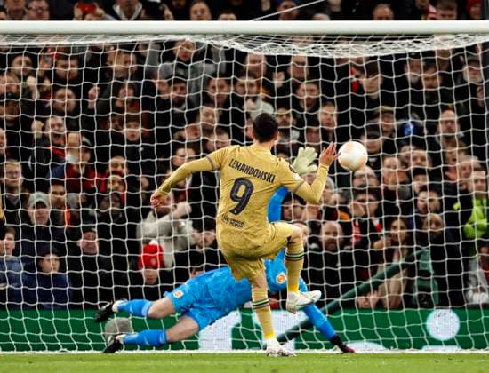 Football - 2022 2023 UEFA Europa League - Play-Off - Second Leg - Manchester United, ManU vs Barcelona - Old Trafford - Thursday 23rd February 2023 Robert Lewandowski of Barcelona scores from the penalty spot to put his team 1-0 ahead in the first half, at Old Trafford. 