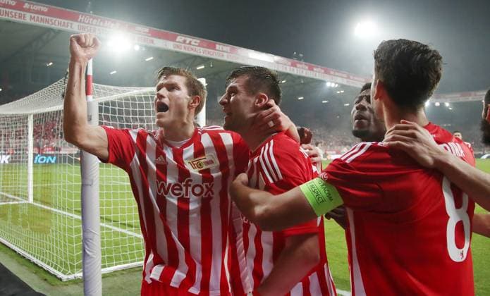 Robin Knoche cheering after 1 0, Kevin Behrens, Rani Khedira joy emotion jubilation sports football soccer UEL UEFA Europa League men season 2022 2023 23 02 2023 1 FC Union Berlin FCU vs Ajax Amsterdam DFL regulations prohibit any use of photographs as image sequences and or quasi video