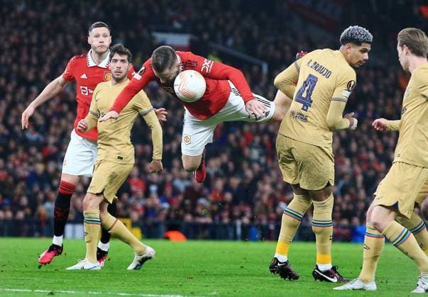 Mandatory Credit: Photo by Matt West Shutterstock (13775740t) Ronald Araujo of Barcelona and Luke Shaw of Manchester United, ManU Manchester United v Barcelona, UEFA Europa League, Play-Off Round, Second Leg, Football, Old Trafford, Manchester, UK - 23 Feb 2023 EDITORIAL USE ONLY No use with unauthorised audio, video, data, fixture lists, club league logos or live services. Online in-match use limited to 120 images, no video emulation. No use in betting, games or single club league player publications. Manchester United v Barcelona, UEFA Europa League, Play-Off Round, Second Leg, Football, Old Trafford, Manchester, UK - 23 Feb 2023 EDITORIAL USE ONLY No use with unauthorised audio, video, data, fixture lists, club league logos or live services. Online in-match use limited to 120 images, no video emulation. No use in betting, games or single club league player publications.  Copyright: xMattxWest Shutterstockx 13775740t