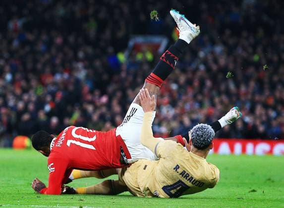 Mandatory Credit: Photo by Matt West Shutterstock (13775740u) Marcus Rashford of Manchester United, ManU and Ronald Araujo of Barcelona Manchester United v Barcelona, UEFA Europa League, Play-Off Round, Second Leg, Football, Old Trafford, Manchester, UK - 23 Feb 2023 EDITORIAL USE ONLY No use with unauthorised audio, video, data, fixture lists, club league logos or live services. Online in-match use limited to 120 images, no video emulation. No use in betting, games or single club league player publications. Manchester United v Barcelona, UEFA Europa League, Play-Off Round, Second Leg, Football, Old Trafford, Manchester, UK - 23 Feb 2023 EDITORIAL USE ONLY No use with unauthorised audio, video, data, fixture lists, club league logos or live services. Online in-match use limited to 120 images, no video emulation. No use in betting, games or single club league player publications.  Copyright: xMattxWest Shutterstockx 13775740u