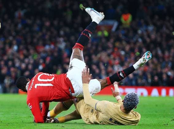 Mandatory Credit: Photo by Matt West Shutterstock (13775740v) Marcus Rashford of Manchester United, ManU and Ronald Araujo of Barcelona Manchester United v Barcelona, UEFA Europa League, Play-Off Round, Second Leg, Football, Old Trafford, Manchester, UK - 23 Feb 2023 EDITORIAL USE ONLY No use with unauthorised audio, video, data, fixture lists, club league logos or live services. Online in-match use limited to 120 images, no video emulation. No use in betting, games or single club league player publications. Manchester United v Barcelona, UEFA Europa League, Play-Off Round, Second Leg, Football, Old Trafford, Manchester, UK - 23 Feb 2023 EDITORIAL USE ONLY No use with unauthorised audio, video, data, fixture lists, club league logos or live services. Online in-match use limited to 120 images, no video emulation. No use in betting, games or single club league player publications.  Copyright: xMattxWest Shutterstockx 13775740v