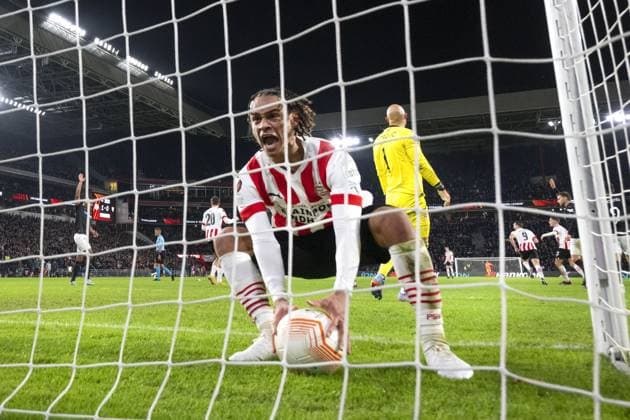 EINDHOVEN - Xavi Simons cheers for Luuk de Jong s disallowed goal during the UEFA Europa league play-off match between PSV Eindhoven and Sevilla FC at Phillips stadium on February 23, 2023 in Eindhoven, Netherlands. ANP OLAF KRAAK PSV Eindhoven v Sevilla FC: Knockout Round Play-Off Leg Two - UEFA Europa League 2022 2023 xVIxANPxSportx xxANPxIVx 463455909 originalFilename: 463455909.jpg