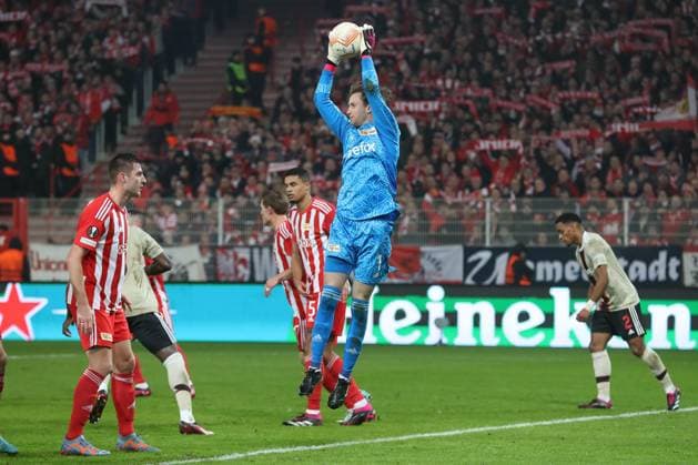 23 02 2023, xtgx, football Europa League 1 8 final, 1 FC Union Berlin Ajax Amsterdam emspor, v l Frederik Roennow Union Berlin, 1 save, holds the ball, catches the ball, parries DFL DFB REGULATIONS PROHIBIT ANY USE OF PHOTOGRAPHS as IMAGE SEQUENCES and or QUASI VIDEO Stadion an der Alten Foersterei