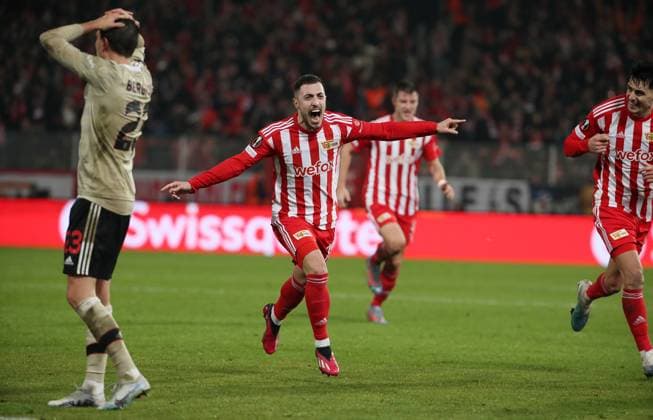 Josip Juranovic jubilant after 2 0, li Steven Berghuis joy emotion jubilation sports football soccer UEL UEFA Europa League men season 2022 2023 23 02 2023 1 FC Union Berlin FCU vs Ajax Amsterdam DFL regulations prohibit any use of photographs as image sequences and or quasi video