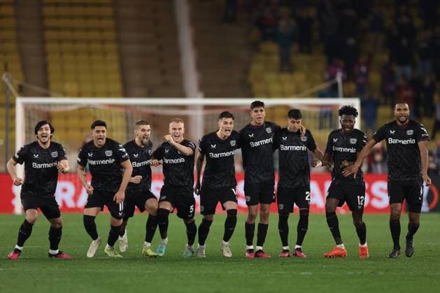 Monaco, Monaco, 23rd February 2023. Bayer Leverkusen players celebrate after Moussa Diaby of Bayer Leverkusen scored the winning penalty in the shoot out of the UEFA Europa League match at Stade Louis II, Monaco. Picture credit should read: Jonathan Moscrop Sportimage EDITORIAL USE ONLY. No use with unauthorised audio, video, data, fixture lists, club league logos or live services. Online in-match use limited to 120 images, no video emulation. No use in betting, games or single club league player publications. SPI-2233-0037
