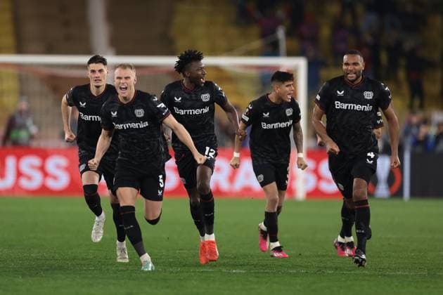 Monaco, Monaco, 23rd February 2023. Bayer Leverkusen players celebrate after Moussa Diaby of Bayer Leverkusen scored the winning penalty in the shoot out of the UEFA Europa League match at Stade Louis II, Monaco. Picture credit should read: Jonathan Moscrop Sportimage EDITORIAL USE ONLY. No use with unauthorised audio, video, data, fixture lists, club league logos or live services. Online in-match use limited to 120 images, no video emulation. No use in betting, games or single club league player publications. SPI-2233-0041