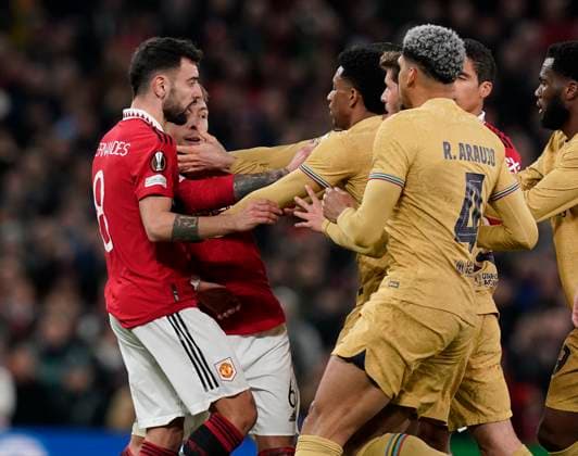 Manchester, England, 23rd February 2023. Bruno Fernandes of Manchester United, ManU stands up to oncoming Barcelona players during the UEFA Europa League match at Old Trafford, Manchester. Picture credit should read: Andrew Yates Sportimage EDITORIAL USE ONLY. No use with unauthorised audio, video, data, fixture lists, club league logos or live services. Online in-match use limited to 120 images, no video emulation. No use in betting, games or single club league player publications. SPI-2256-0084
