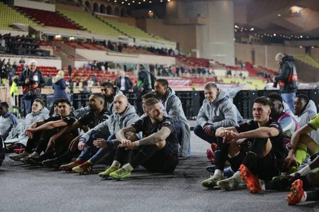 Bayer Leverkusen players listing to they fans during the Uefa Europa League, football match between As Monaco and Bayer 04 Leverkusen,on 23 February 2023 at State Luis II in Monaco, Photo Ndrerim Kaceli  Copyright: xNderimxKaceli LiveMediax xipa-agx xLivexMediax 0 IPA_IPA36303787