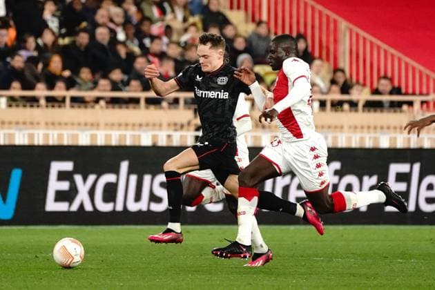 Florian Wirtz (Bayer 04 Leverkusen) - Malang Sarr (AS Monaco) FOOTBALL : AS Monaco vs Bayer 04 Leverkusen - League Europa - Monaco - 23 02 2023 NorbertScanella Panoramic 