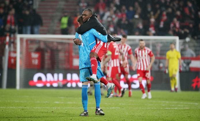 Goalkeeper Frederik Rönnow, Jerome Roussillon cheering after end of match joy emotion jubilation sports football soccer UEL UEFA Europa League men season 2022 2023 23 02 2023 1 FC Union Berlin FCU vs Ajax Amsterdam DFL regulations prohibit any use of photographs as image sequences and or quasi video