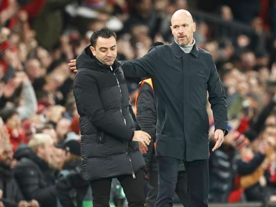 Football - 2022 2023 UEFA Europa League - Play-Off - Second Leg - Manchester United, ManU vs Barcelona - Old Trafford - Thursday 23rd February 2023 Manchester United manager Erik ten Hag consoles Barcelona coach Xavi Hernandez at the end of the game after United s 2-1 win put them into the knock stages of the Europa Cup, at Old Trafford. 