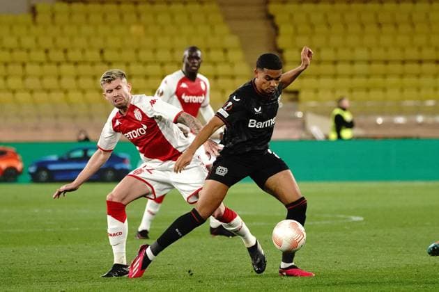 Amine Adli (Bayer 04 Leverkusen) - Caio Henrique (AS Monaco) FOOTBALL : AS Monaco vs Bayer 04 Leverkusen - League Europa - Monaco - 23 02 2023 NorbertScanella Panoramic 
