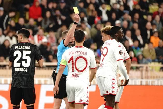 Carton jaune - Alejandro Hernandez (arbitre) - Youssouf Fofana (AS Monaco) FOOTBALL : AS Monaco vs Bayer 04 Leverkusen - League Europa - Monaco - 23 02 2023 NorbertScanella Panoramic 