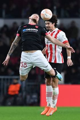 Soccer Europa League knockout round play off PSV Eindhoven FC Sevilla on 23 02 2023 at the Philips Stadium in Eindhoven Lucas Ocampos Sevilla , front Andre Ramalho Eindhoven , back xRx