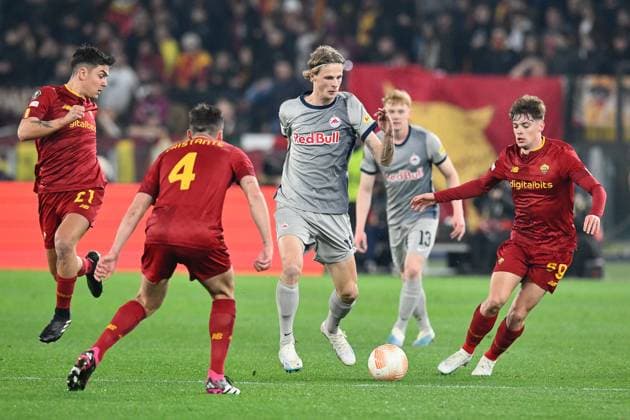 23rd February 2023, Stadio Olimpico, Rome, Italy; Europa League Football; Roma versus FC Red Bull Salzburg; Maurits Kjaergaard of FC Salzburg takes on Nicola Zalewski of AS Roma  ActionPlus12479570 AllShotLive