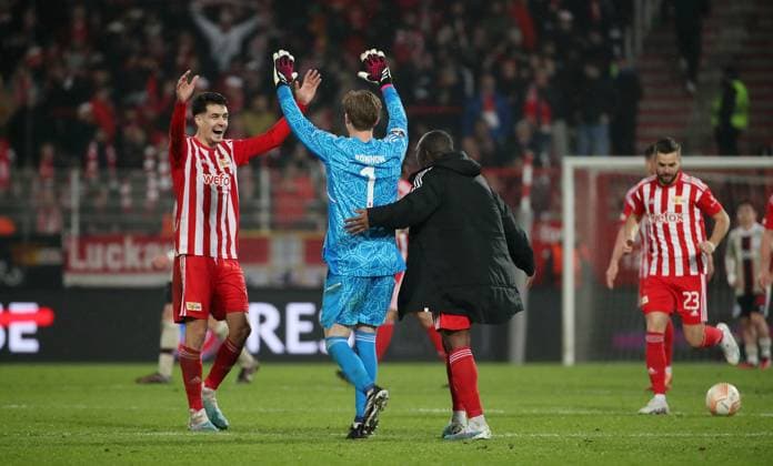 Diogo Leite, goalkeeper Frederik Rönnow, Jerome Roussillon cheering after final whistle end of game joy emotion jubilation sports football soccer UEL UEFA Europa League men season 2022 2023 23 02 2023 1 FC Union Berlin FCU vs Ajax Amsterdam DFL regulations prohibit any use of photographs as image sequences and or quasi video