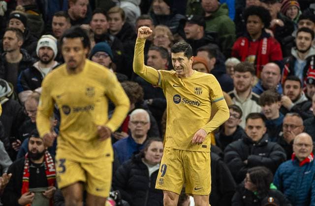 (230224) -- MANCHESTER, Feb. 24, 2023 -- Barcelona s Robert Lewandowski celebrates after scoring a penalty kick during the UEFA Europa League play-off 2nd leg match between Manchester United, ManU and Barcelona in Manchester, Britain, Feb. 23, 2023. (SP)BRITAIN-MANCHESTER-FOOTBALL-UEFA EUROPA LEAGUE-MANCHESTER UNITED VS BARCELONA LixYing 