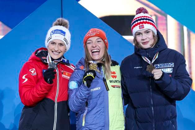 NORDIC SKIING - FIS Nordic WC Planica 2023 KRANJSKA GORA,SLOVENIA,24.FEB.23 - NORDIC SKIING - FIS Nordic World Ski Championships, medal plaza, award ceremony. Image shows Eva Pinkelnig (AUT), Katharina Althaus (GER) and Anna Odine Stroem (NOR). Keywords: medal.  GEPAxpictures xPatrickxSteiner