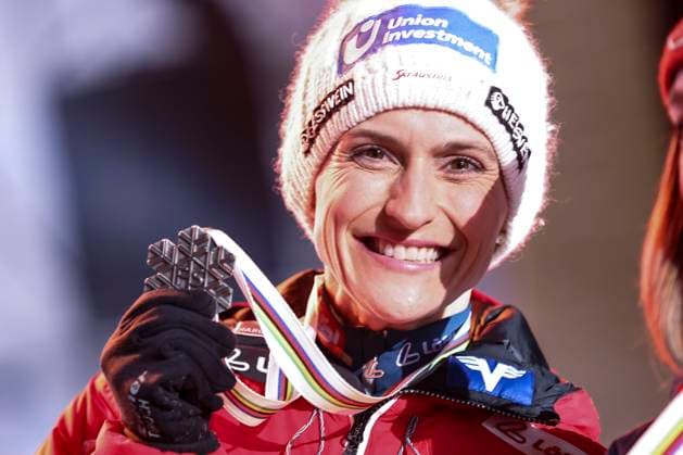 NORDIC SKIING - FIS Nordic WC Planica 2023 KRANJSKA GORA,SLOVENIA,24.FEB.23 - NORDIC SKIING - FIS Nordic World Ski Championships, medal plaza, award ceremony. Image shows the rejoicing of Eva Pinkelnig (AUT). Keywords: medal.  GEPAxpictures xPatrickxSteiner