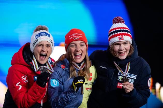 World champion Katharina Althaus Germany, center, on the podium celebrating victory and gold medal in ski jumping from HS102 normal hill, next to her Eva Pinkelnig Austria , Anna Odine Stroem Norway , SLO, FIS Nordic World Ski Championships Planica 2023, World Championship award ceremony Kranjska Gora, 24 02 2023, season 2022 2023 SLO, FIS Nordic World Ski Championships Planica 2023, World Championship award ceremony Kranjska Gora, 24 02 2023, season 2022 2023 Planica Copyright: xEibner Memmlerx EP_MMR