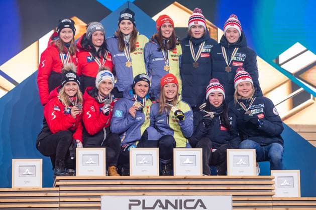 NORDIC SKIING - FIS Nordic WC Planica 2023 KRANJSKA GORA,SLOVENIA,25.FEB.23 - NORDIC SKIING, Ski jumping, Skispringen, Ski, nordisch - FIS Nordic World Ski Championships, medal plaza, award ceremony. Image shows Austrian, German and Norwegian teams.  GEPAxpictures xGintarexKarpaviciute