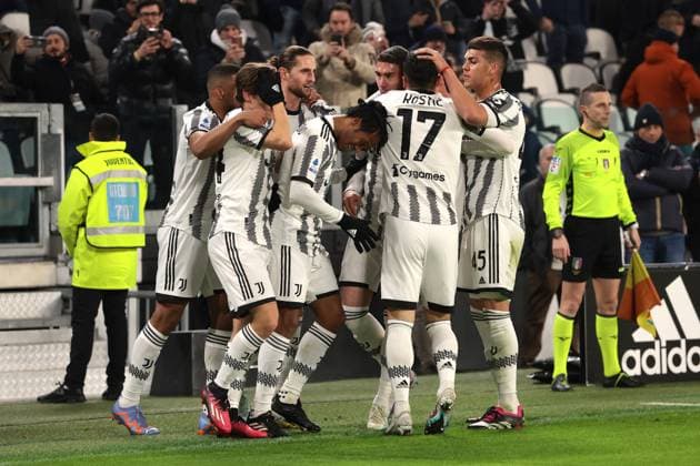 Turin, Italy, 28th February 2023. Juan Cuadrado of Juventus celebrates with team mates after scoring to level the game at 1-1 during the Serie A match at Allianz Stadium, Turin. Picture credit should read: Jonathan Moscrop Sportimage EDITORIAL USE ONLY. No use with unauthorised audio, video, data, fixture lists, club league logos or live services. Online in-match use limited to 120 images, no video emulation. No use in betting, games or single club league player publications. SPI-2237-0007